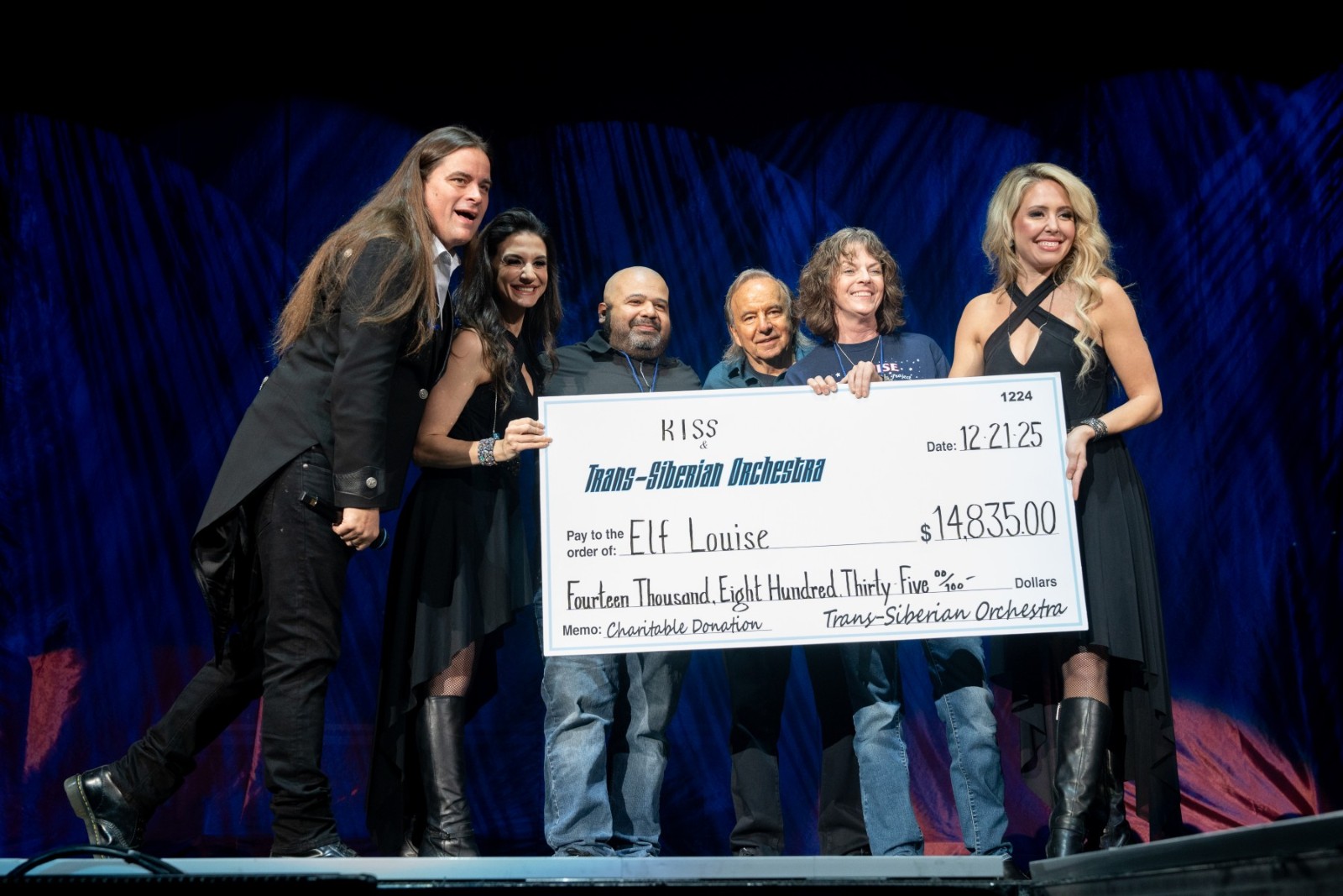 TSO 2025 Evening Performance onstage photo (L-R) Andrew Ross (TSO), Asha Mevlana (TSO), Chris Sifuentes (KISS-FM), Karen Gordon (Director, Elf Louise), Jack Orbin (President Stone City Attractions) and Chloe Lowery (TSO)